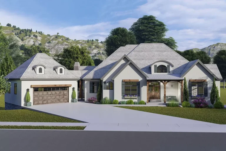 Spacious French Country Home Plan with Lower-level Apartment and Angled Garage (Floor Plan)