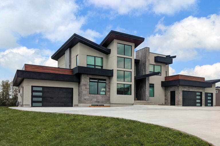 Modern Home Plan Under 4200 Square Feet with Over 2000 Square Feet of Garage Space (Floor Plan)